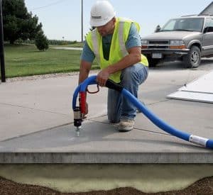 Read more about the article Concrete vs. Asphalt: Choosing the Right Material for Your Driveway